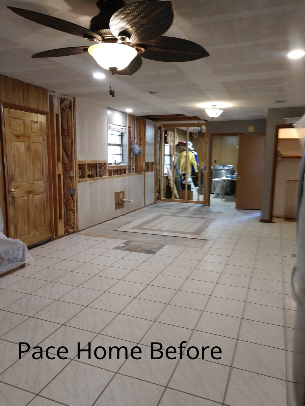 Tile floor before flooring update in Pace Florida home